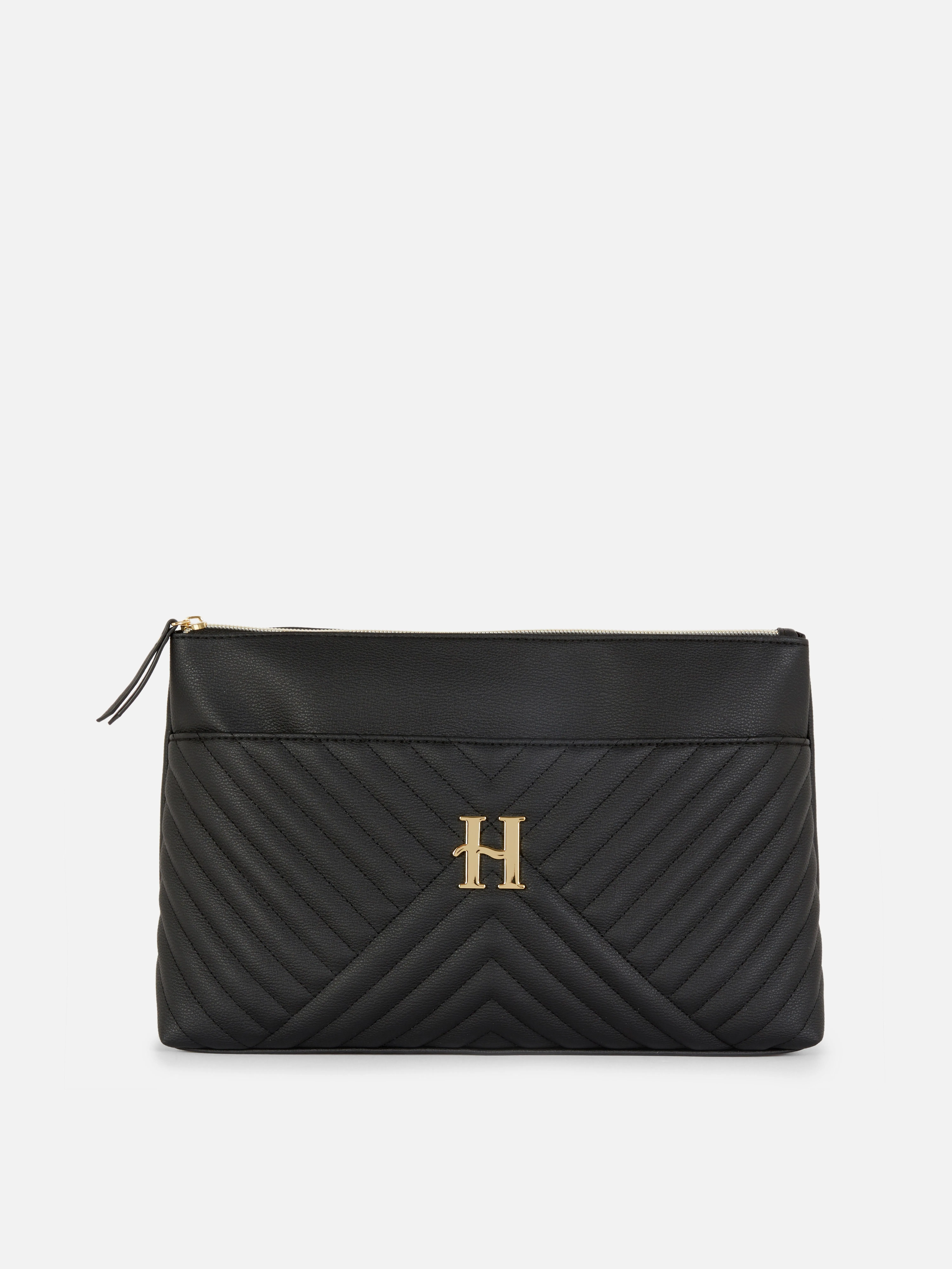 Bolsa de maquillaje acolchada con inicial