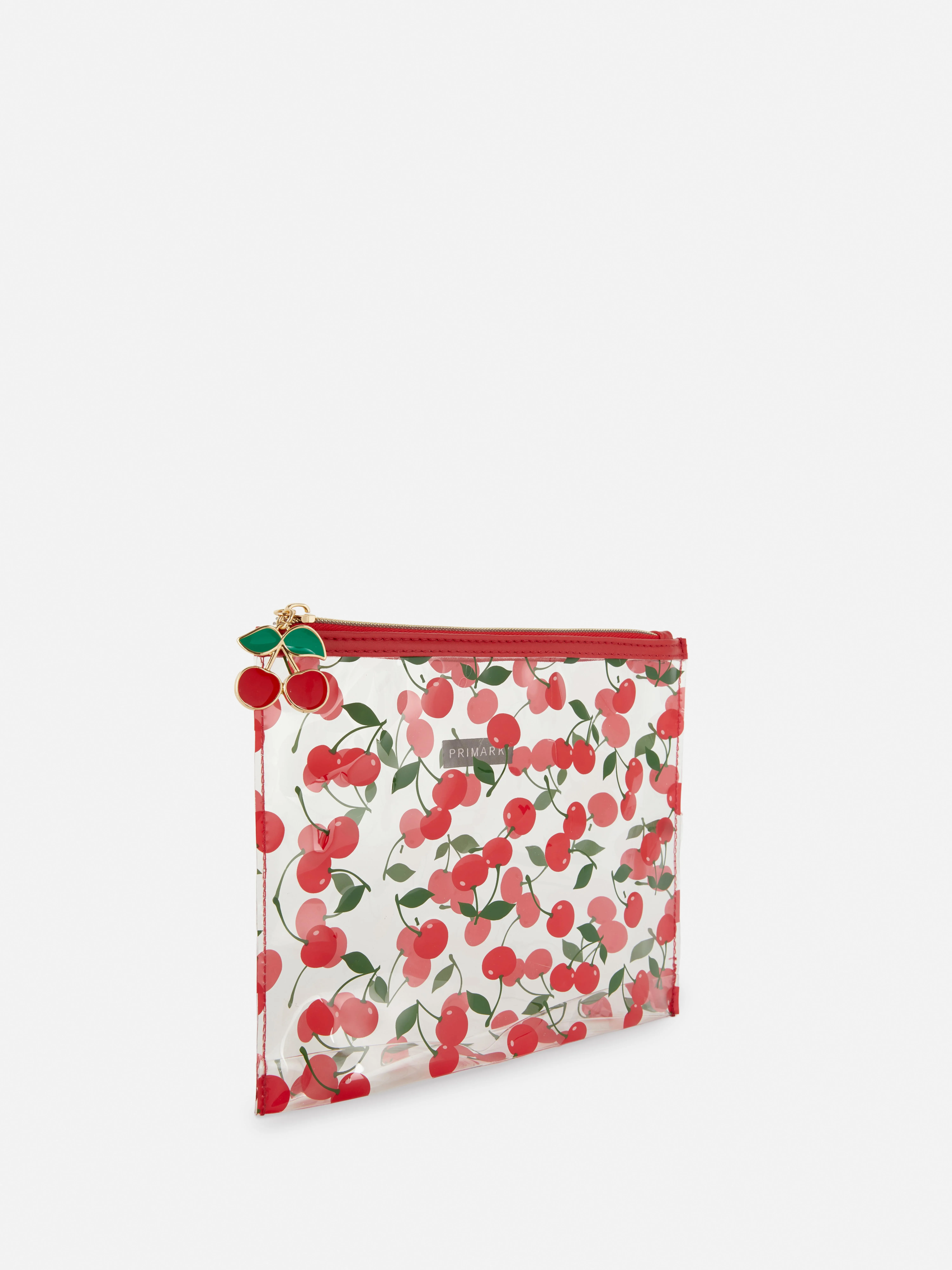 Bolsa de maquillaje transparente con cerezas