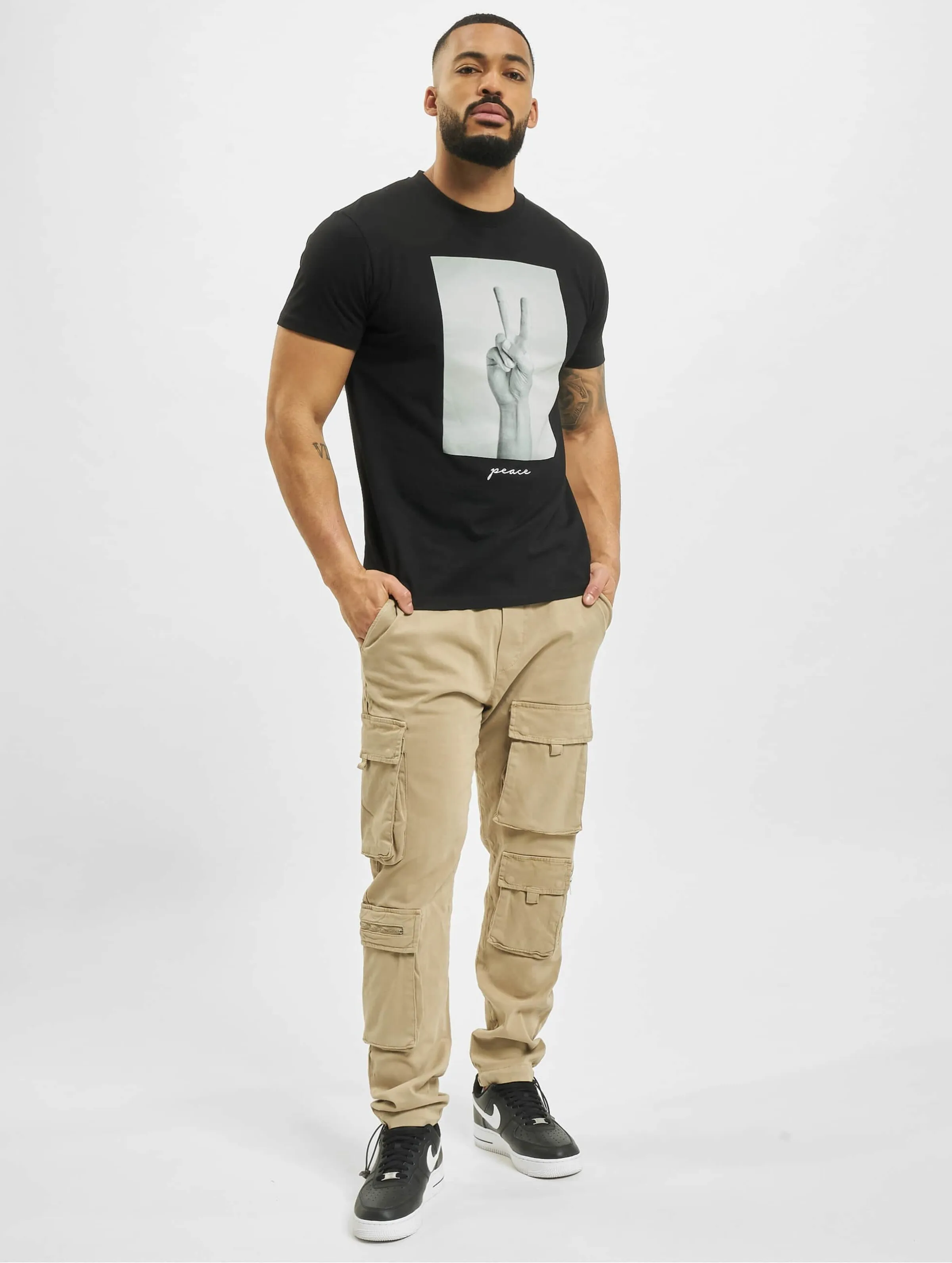 Mister Tee Peace Sign