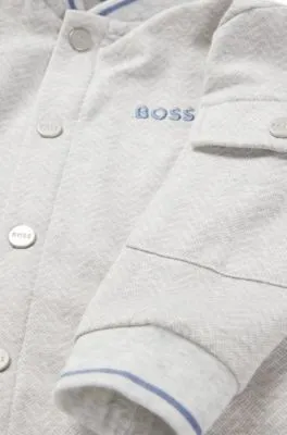 Mono para bebé en algodón elástico con estampado de espiga
